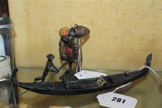 Small cold-painted bronze figure of a water carrier & bronzed model of a gondola (a.f)